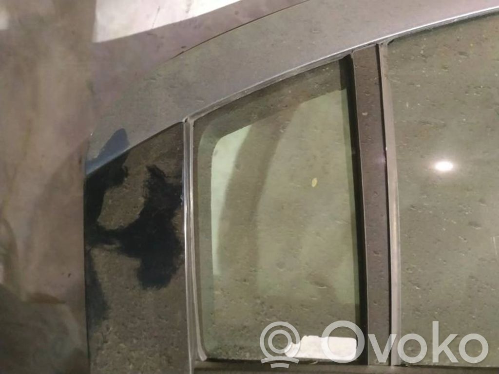 Ventanilla de ventilación de la puerta trasera