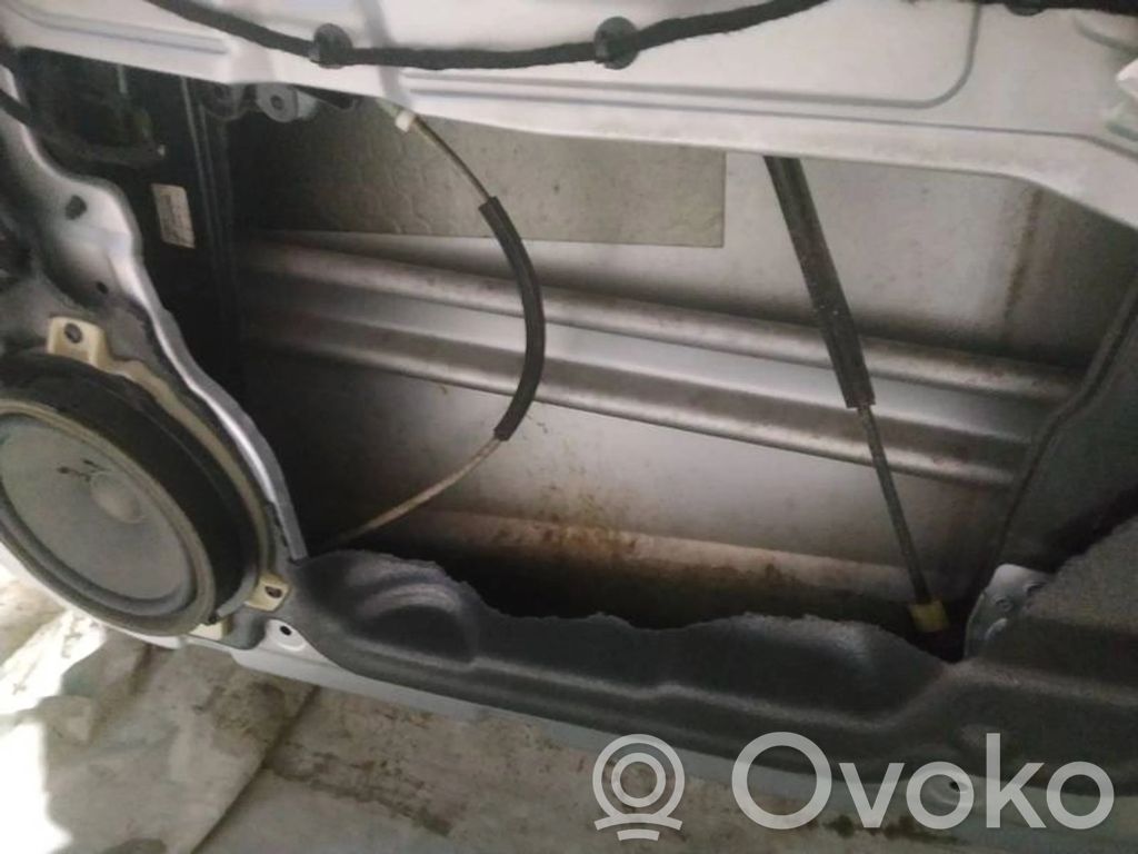 Regulador con motor de la ventanilla de la puerta corredera