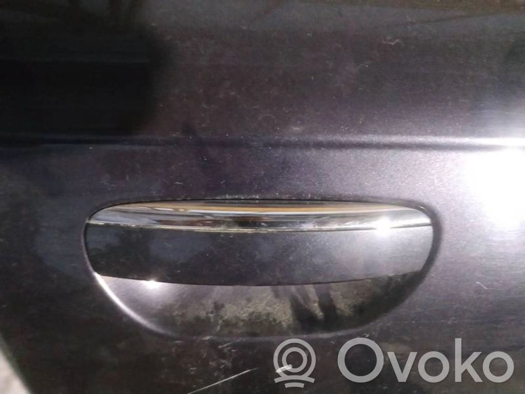Manecilla externa puerta delantera