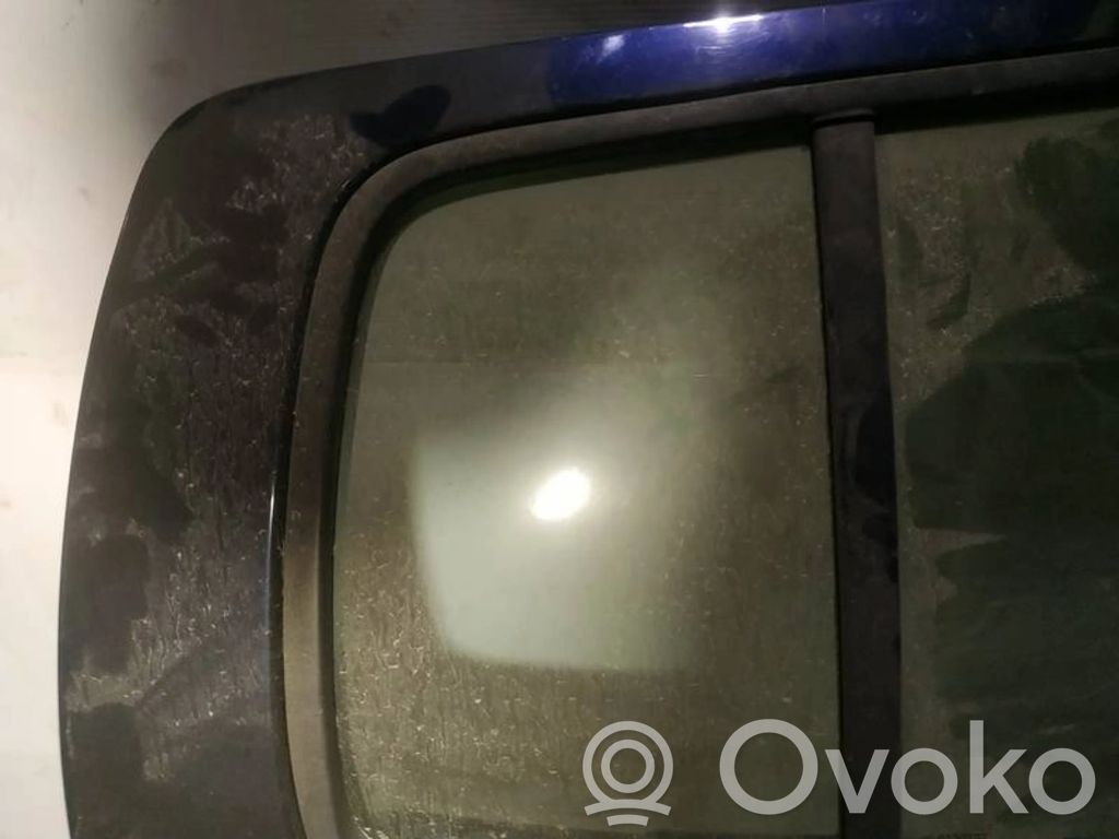 Renault Megane I Vetro del deflettore posteriore 