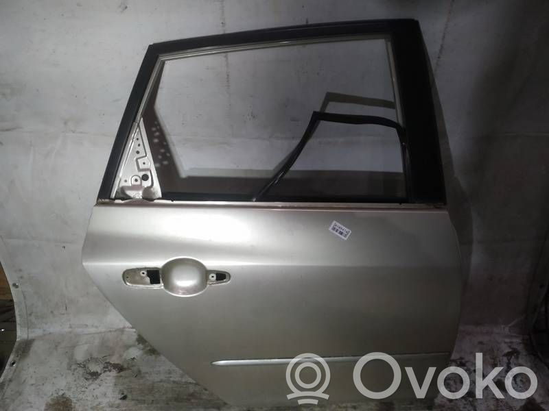 Mazda 3 I Rear door 