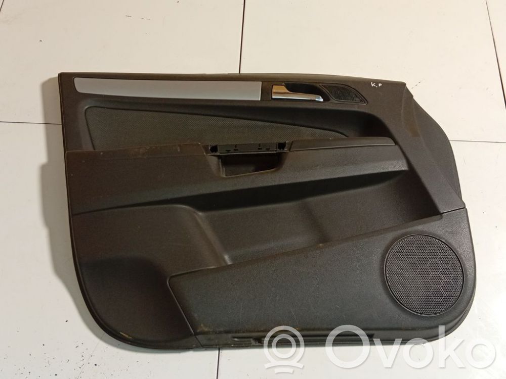 Opel Zafira B Revestimiento de puerta delantera 
