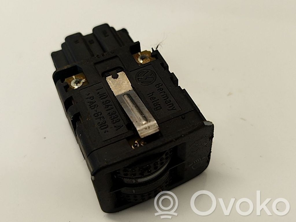Volkswagen Golf IV Interruttore di regolazione livello altezza dei fari