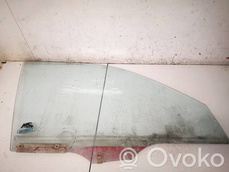 Mazda 121 SM Vitre de fenêtre porte avant (4 portes)
