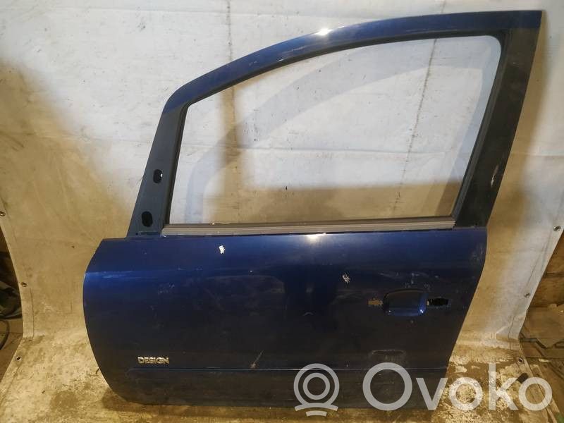 Opel Zafira B Передняя дверь 