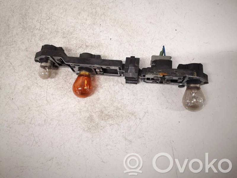 Volvo S60 Takavalon polttimon suojan pidike 