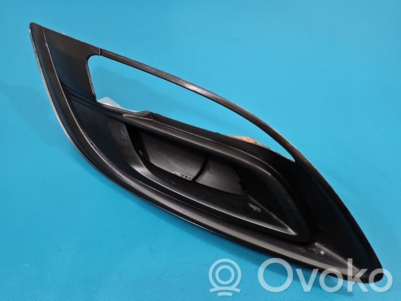 Opel Astra J Moldura/rejilla de la luz antiniebla delantera 