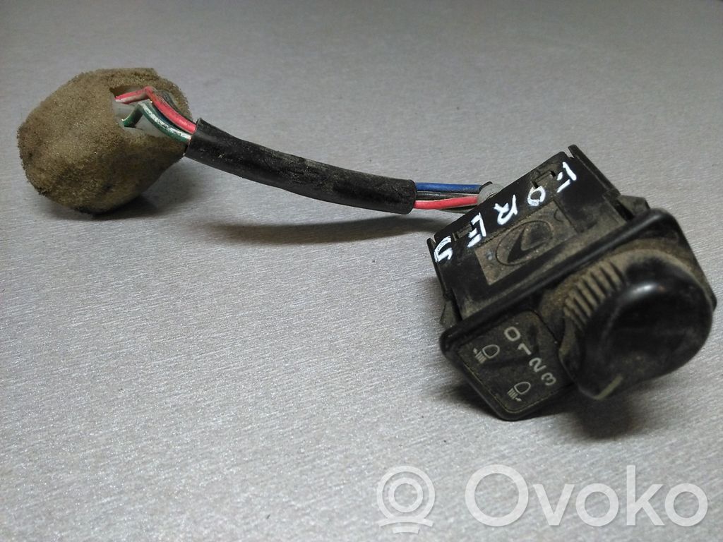 Headlight level height control switch