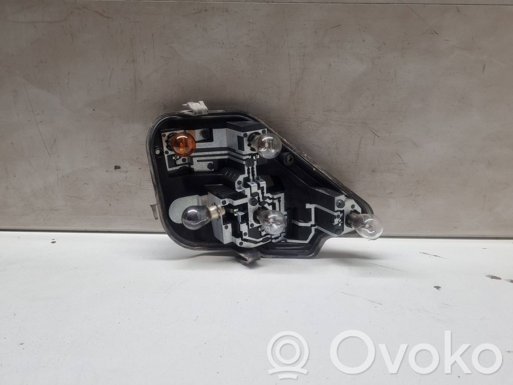 Opel Astra H Aizmugures spuldzes vāka turētājs 