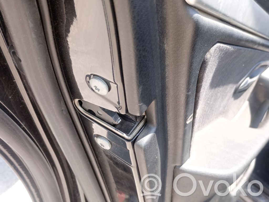 Cerradura de puerta trasera
