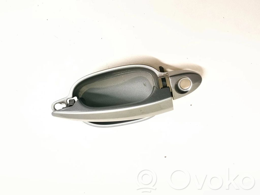 Manecilla externa puerta delantera