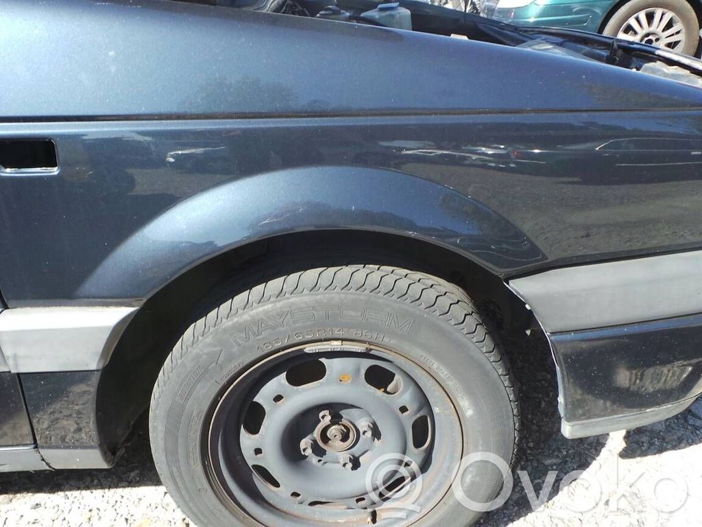Volkswagen PASSAT B4 Sparnas 