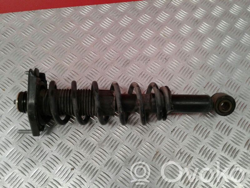 Toyota Corolla E120 E130 Aizmugurē amortizators 