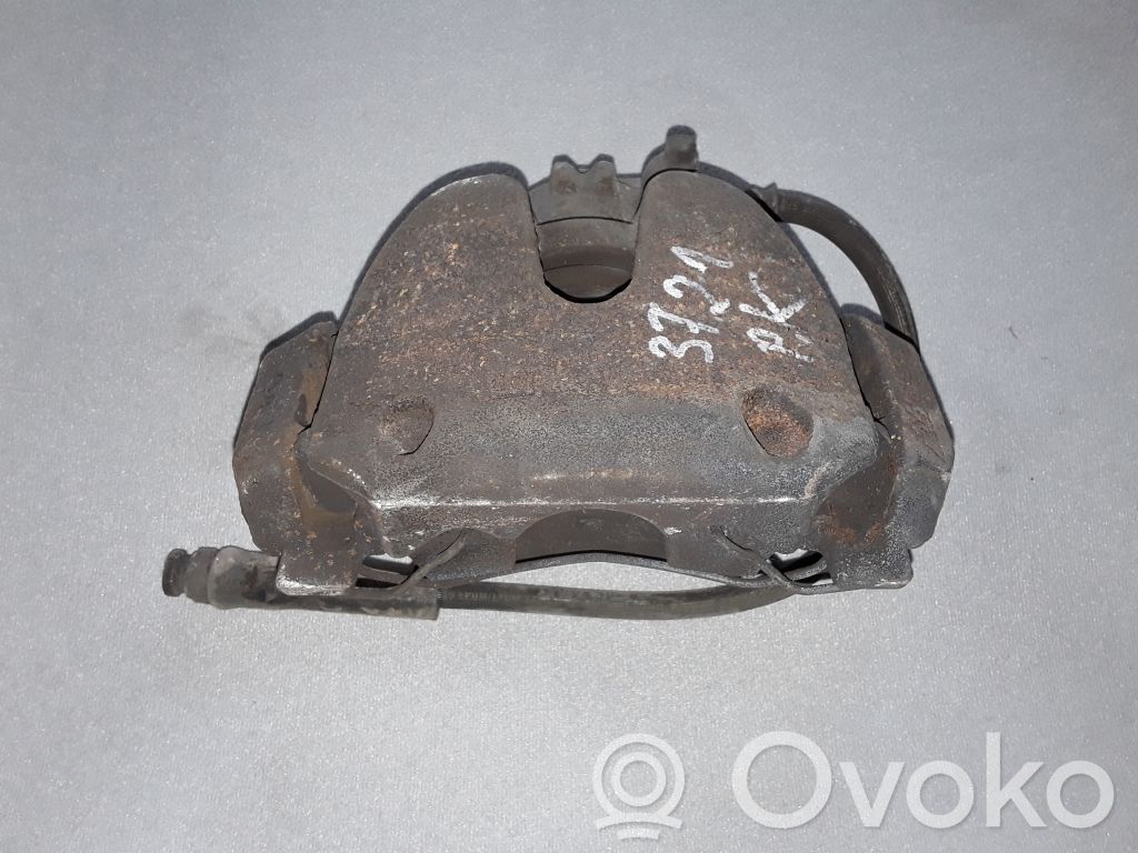 Opel Corsa E Front brake caliper 