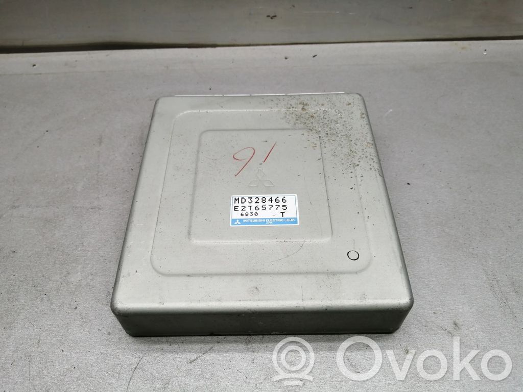 Engine control unit/module   MD328466,E2T65775
