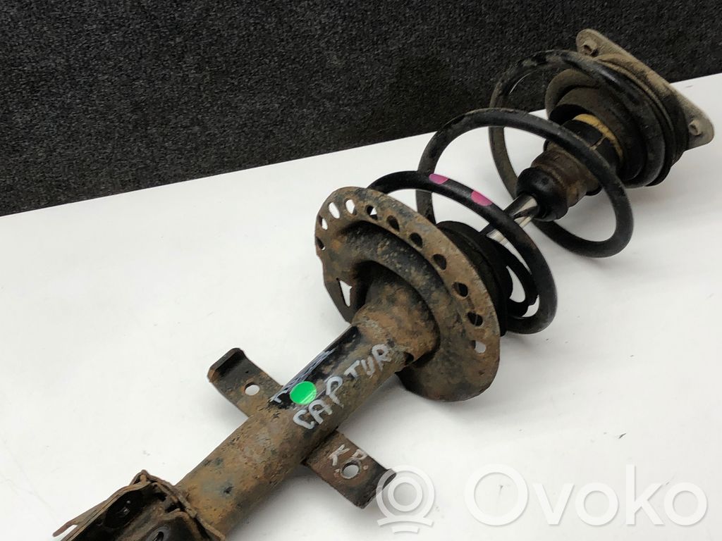 Front shock absorber with coil spring