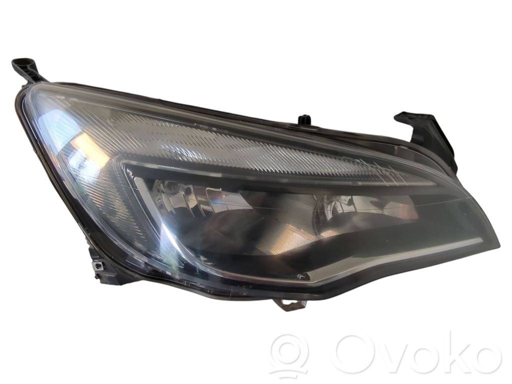 Opel Astra J Lampa przednia 