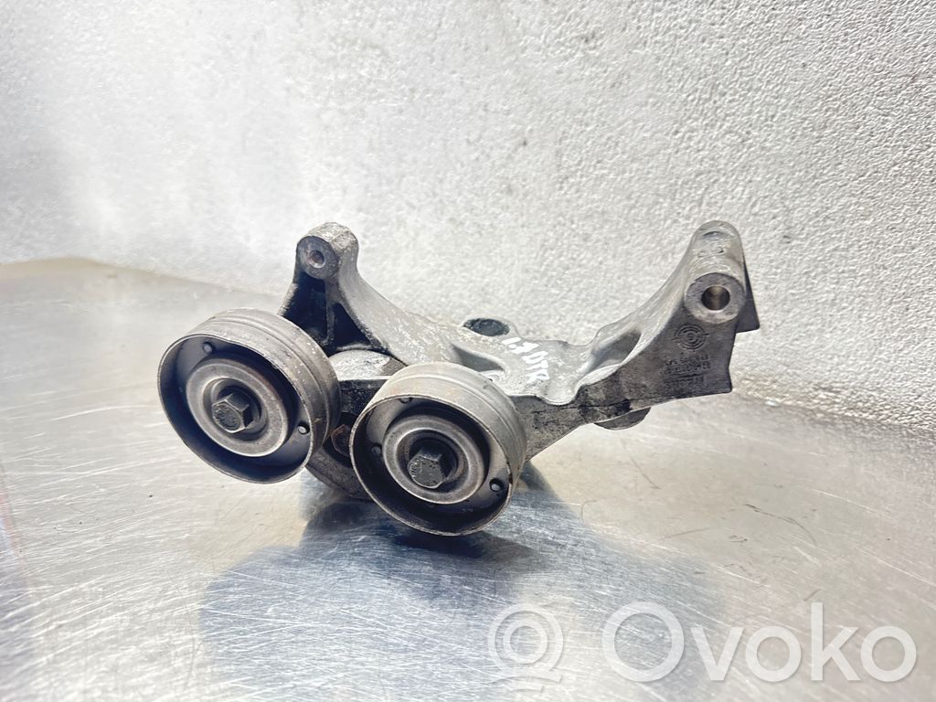 Opel Astra H Generator/alternator belt tensioner 