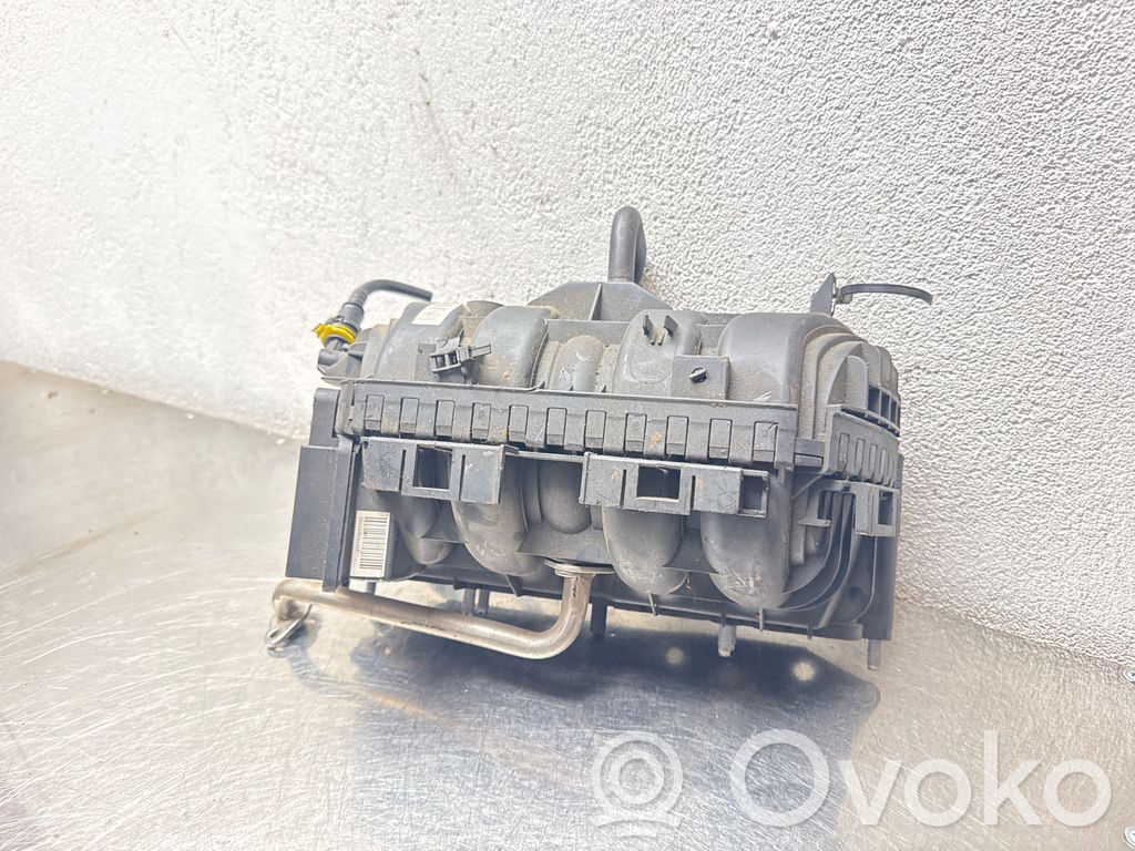 Opel Corsa D Kolektor ssący 