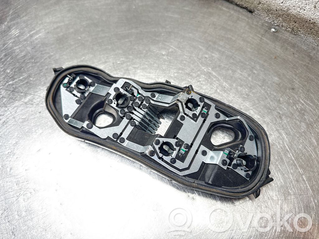 Opel Corsa D Cubierta del soporte de la lámpara de la luz trasera 