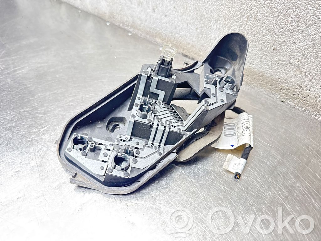 Opel Corsa D Takavalon polttimon suojan pidike 