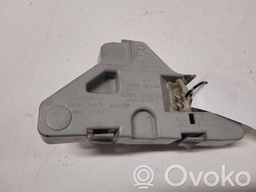 Mazda 121 Tail light bulb cover holder 
