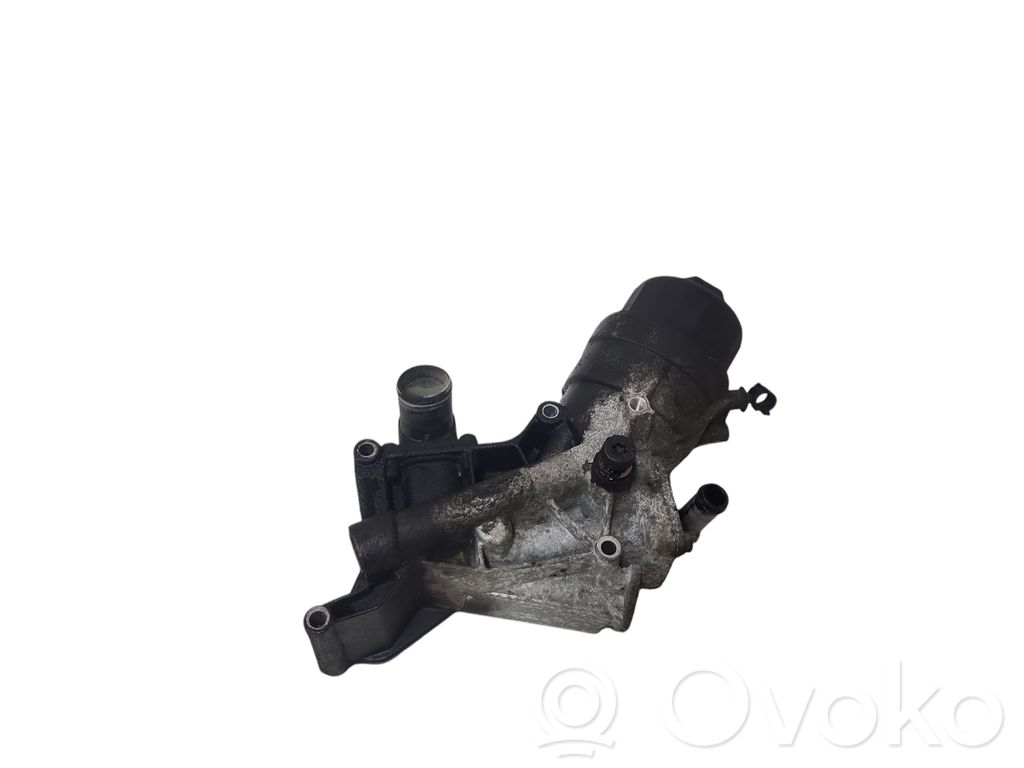 Opel Corsa D Supporto di montaggio del filtro dell’olio 