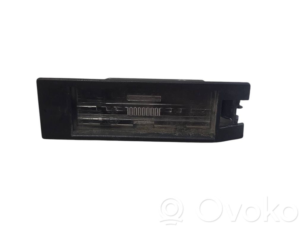 Opel Astra J Éclairage de plaque d'immatriculation 