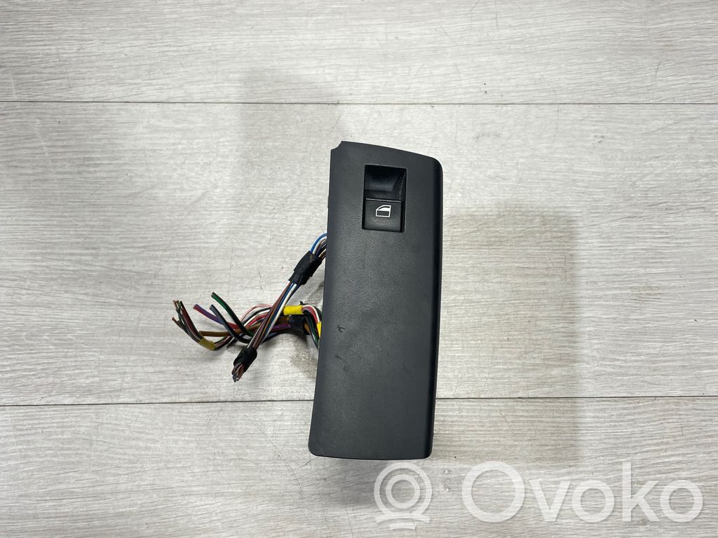 Electric window control switch   6952800