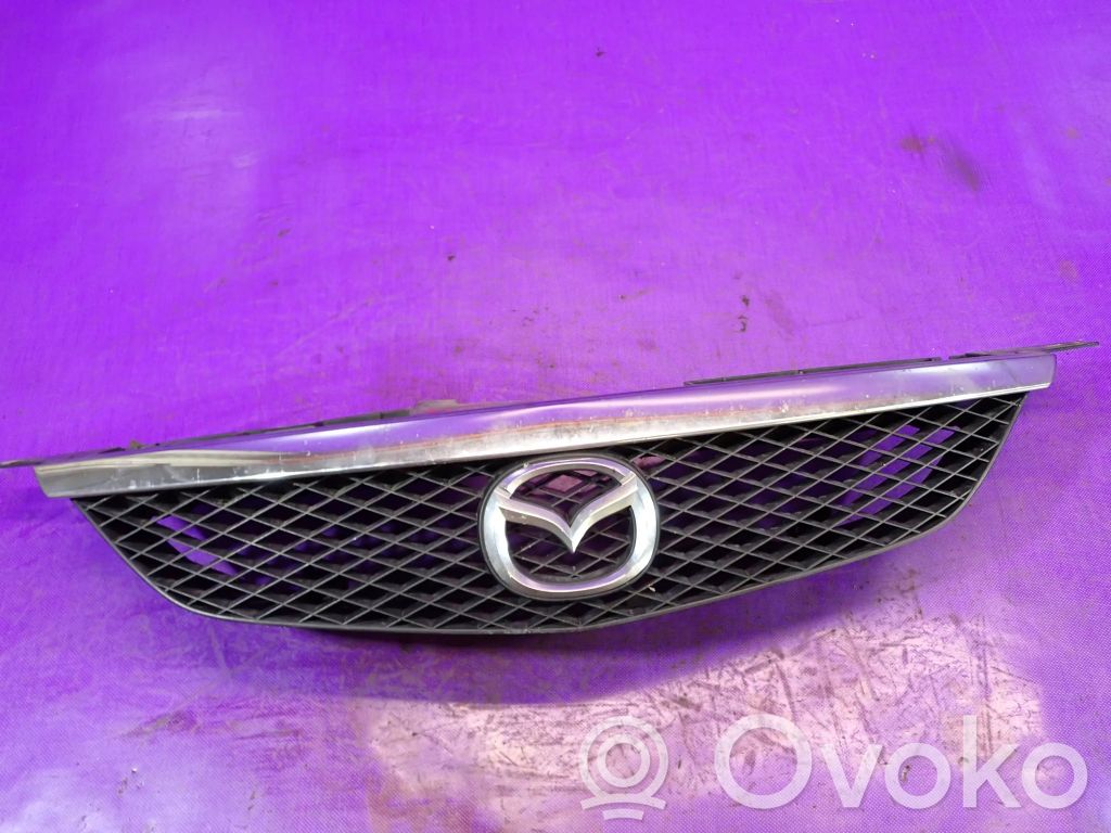 Mazda 323 Front bumper upper radiator grill 