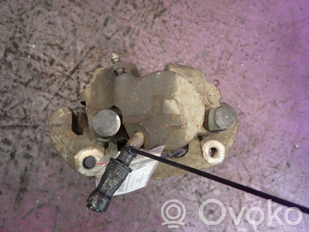 Caliper de freno delantero