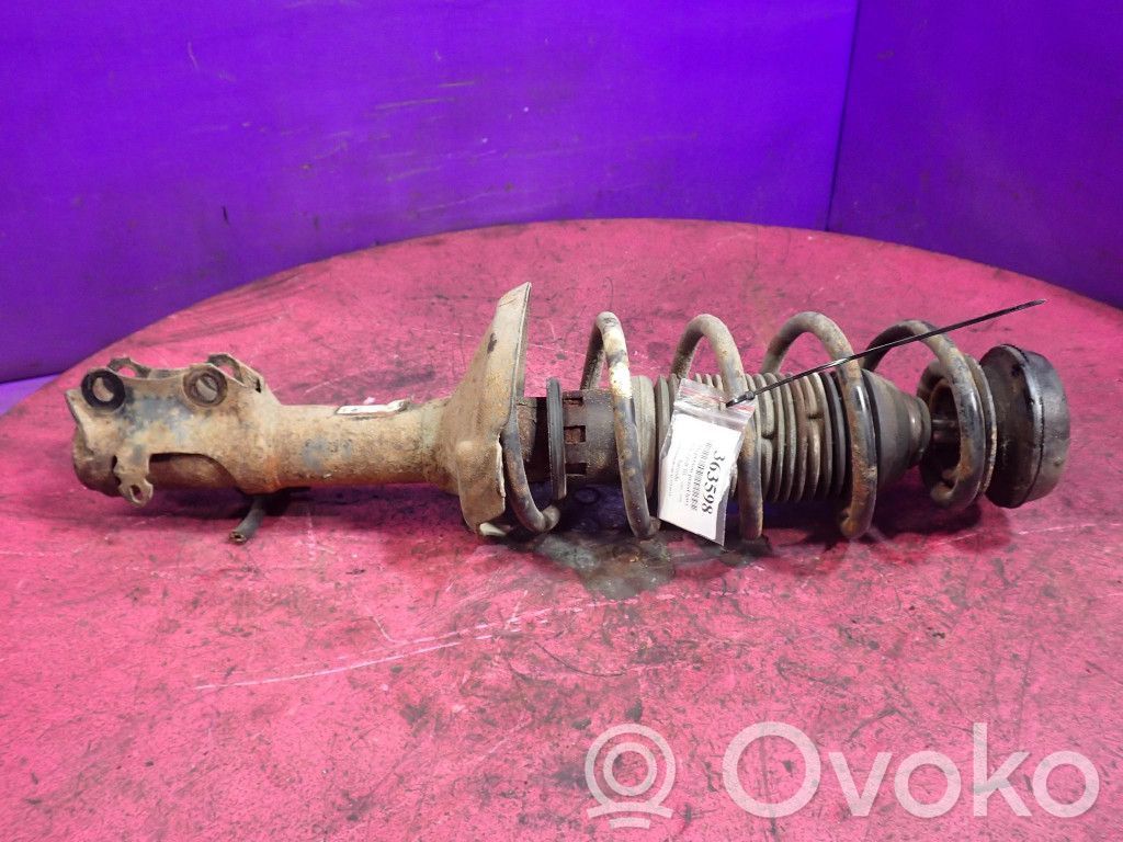 Volkswagen Golf III Etuiskunvaimennin kierrejousella 