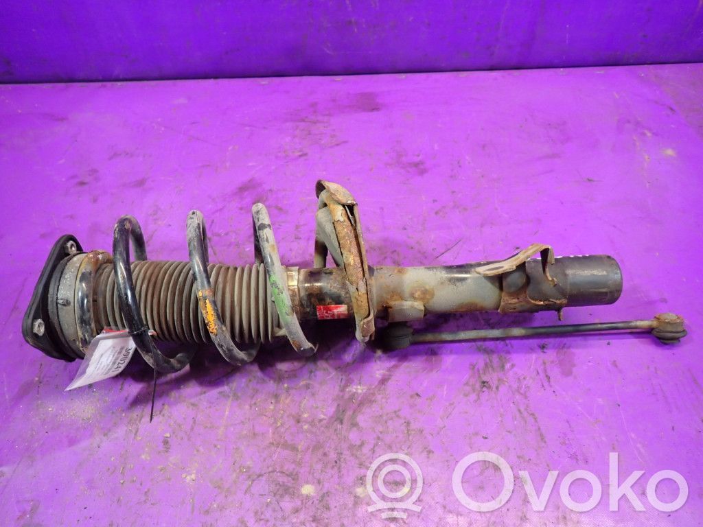 Front shock absorber with coil spring