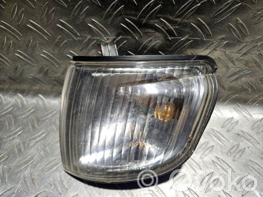Front indicator light   92303M31