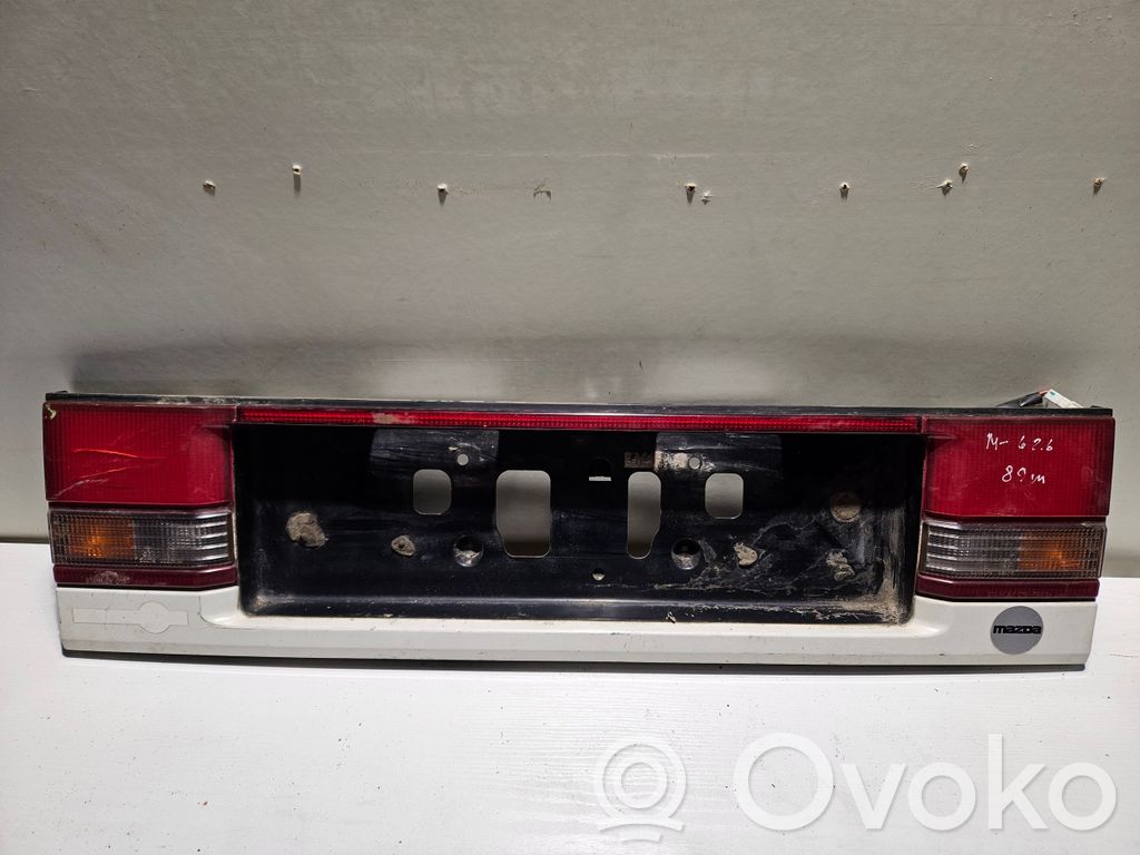 Mazda 626 Rear light center trim bar blend 