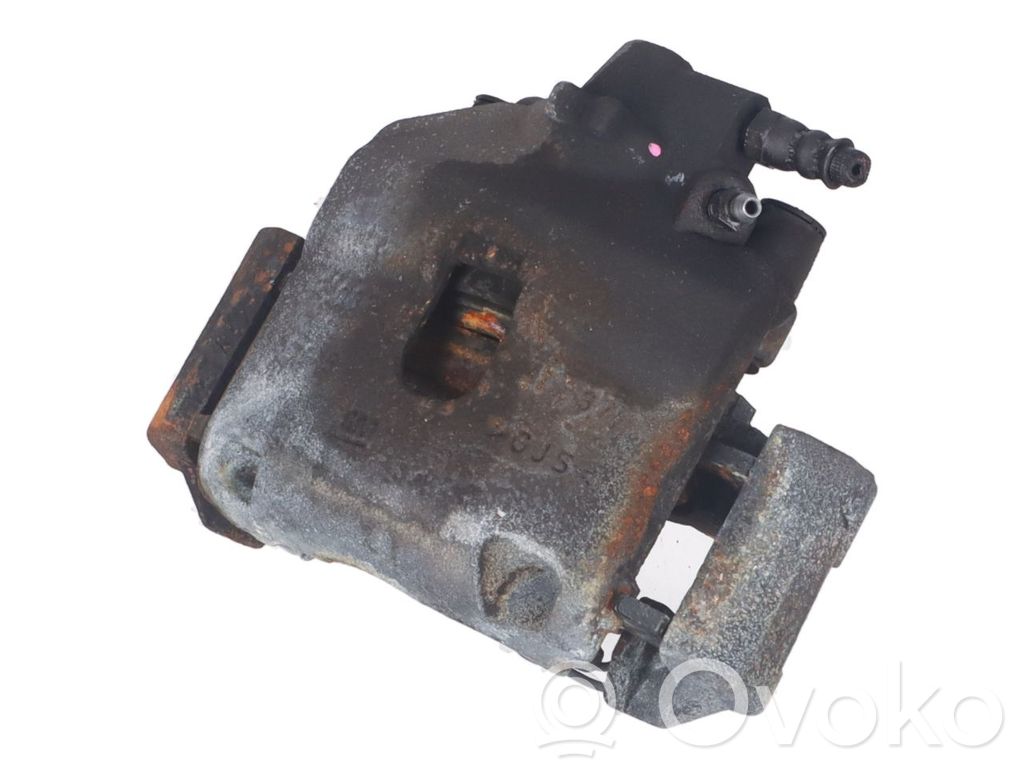 Opel Corsa E Front brake caliper 