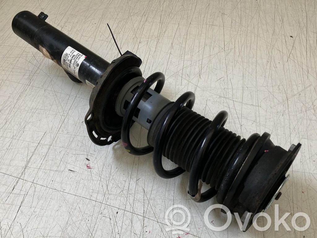 Volkswagen Golf VIII Front shock absorber with coil spring 