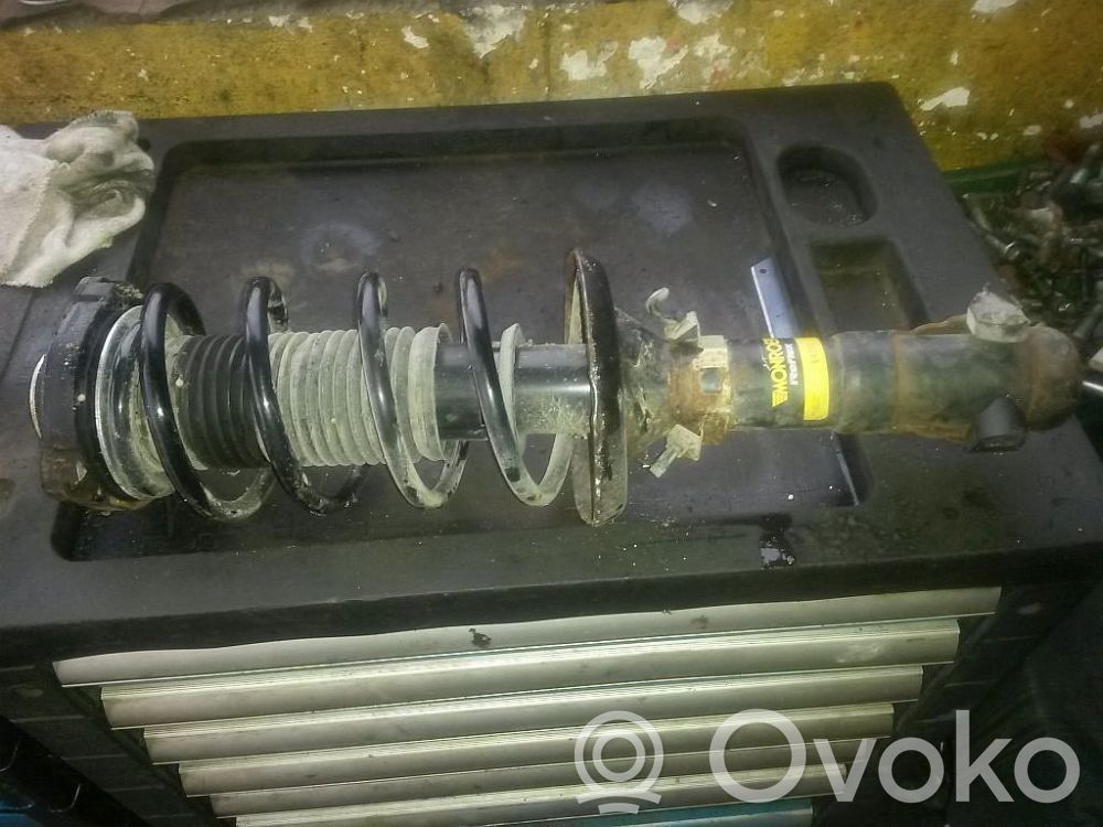 Volkswagen Polo III 6N 6N2 6NF Amortyzator osi przedniej ze sprężyną 
