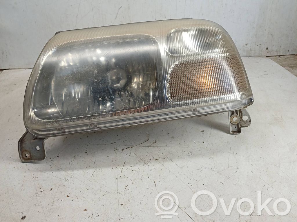 Suzuki Grand Vitara I Lampa przednia 