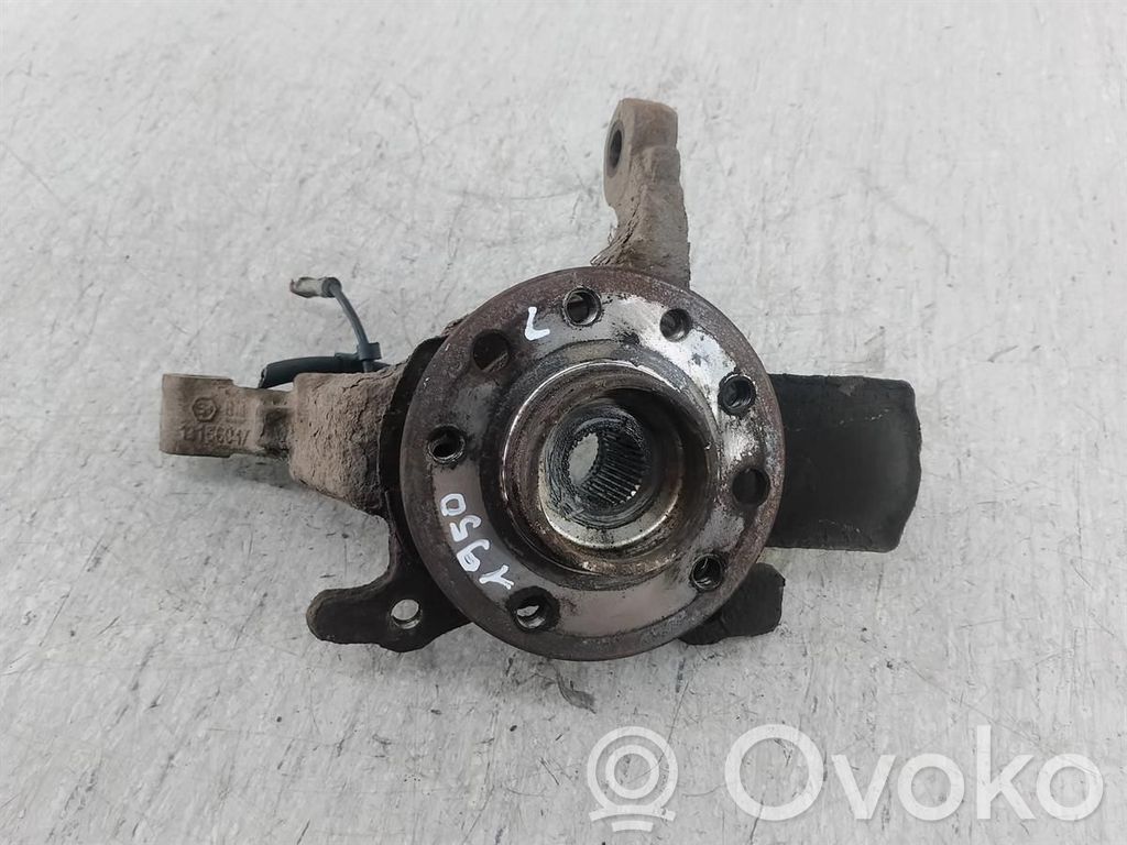 Opel Astra H Zwrotnica koła przedniego 