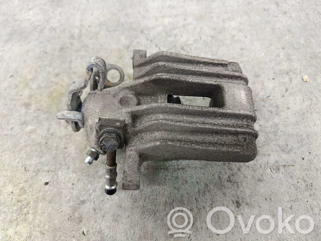 Volkswagen Golf IV Tylny zacisk hamulcowy 