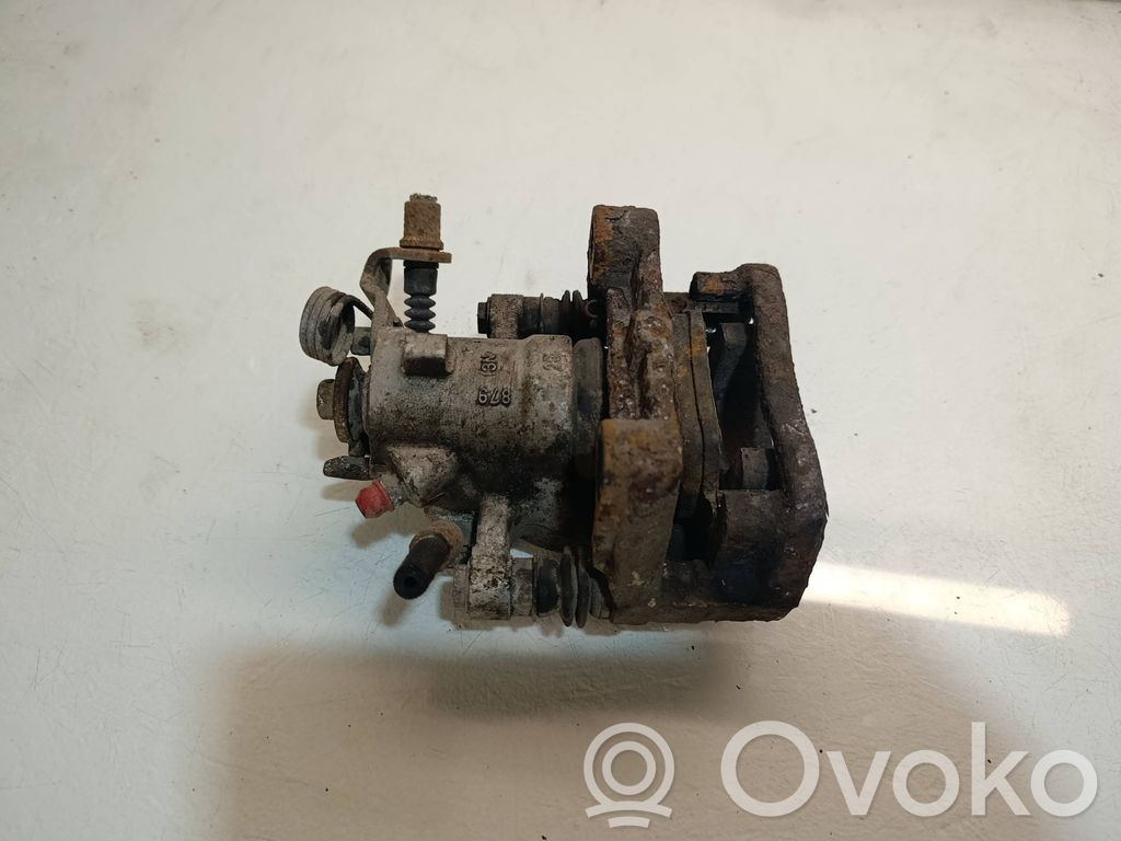 Opel Combo C Tylny zacisk hamulcowy 