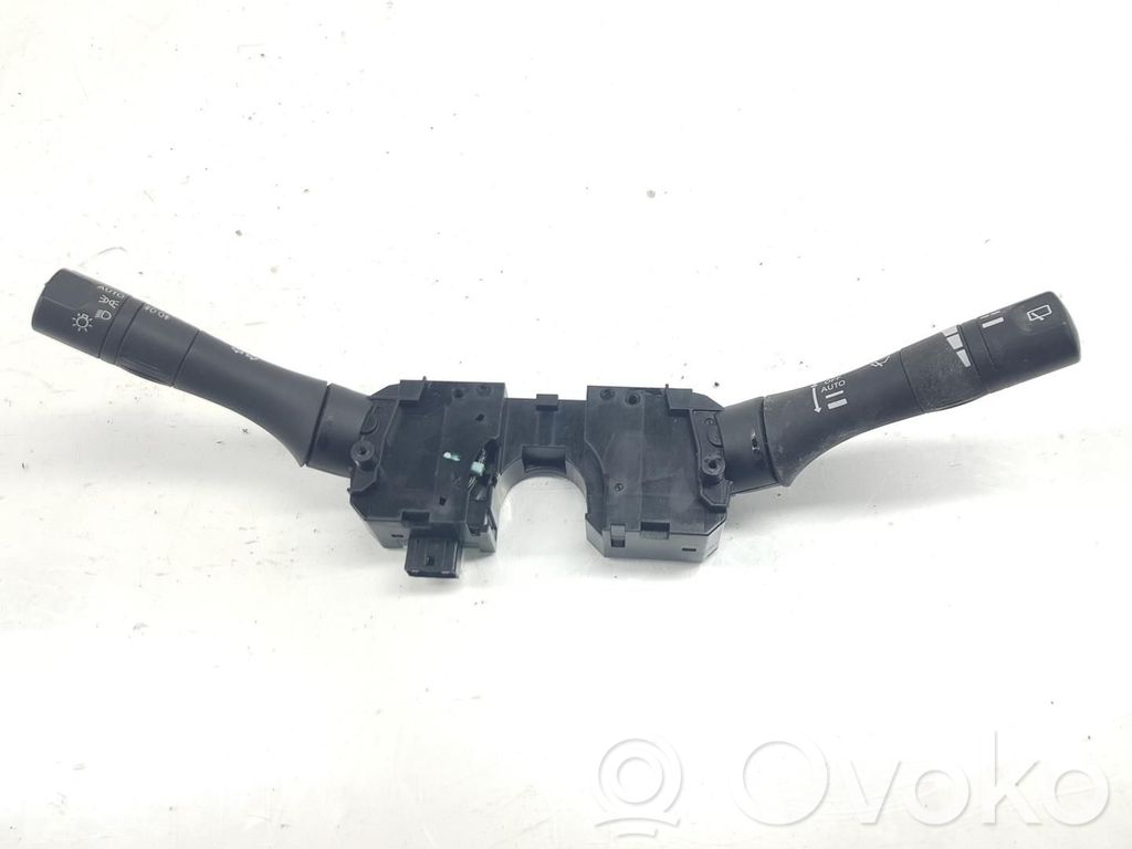 Nissan Juke I F15 Pulsanti/interruttori sul volante
