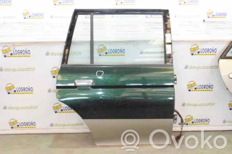 Mitsubishi Montero Regulador manual de la ventanilla trasera 