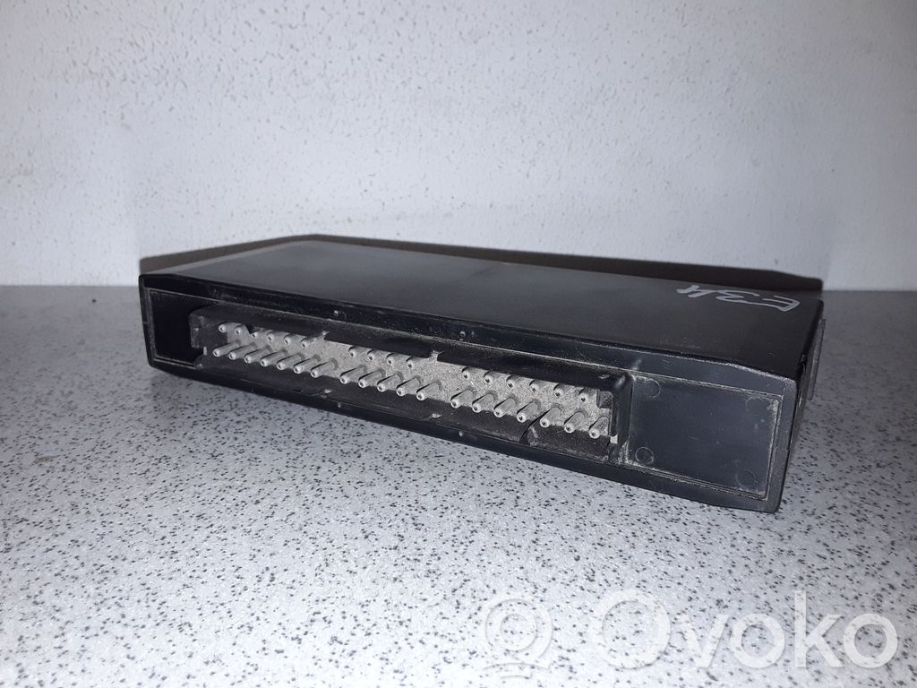 BMW 5 E34 Komforto modulis 