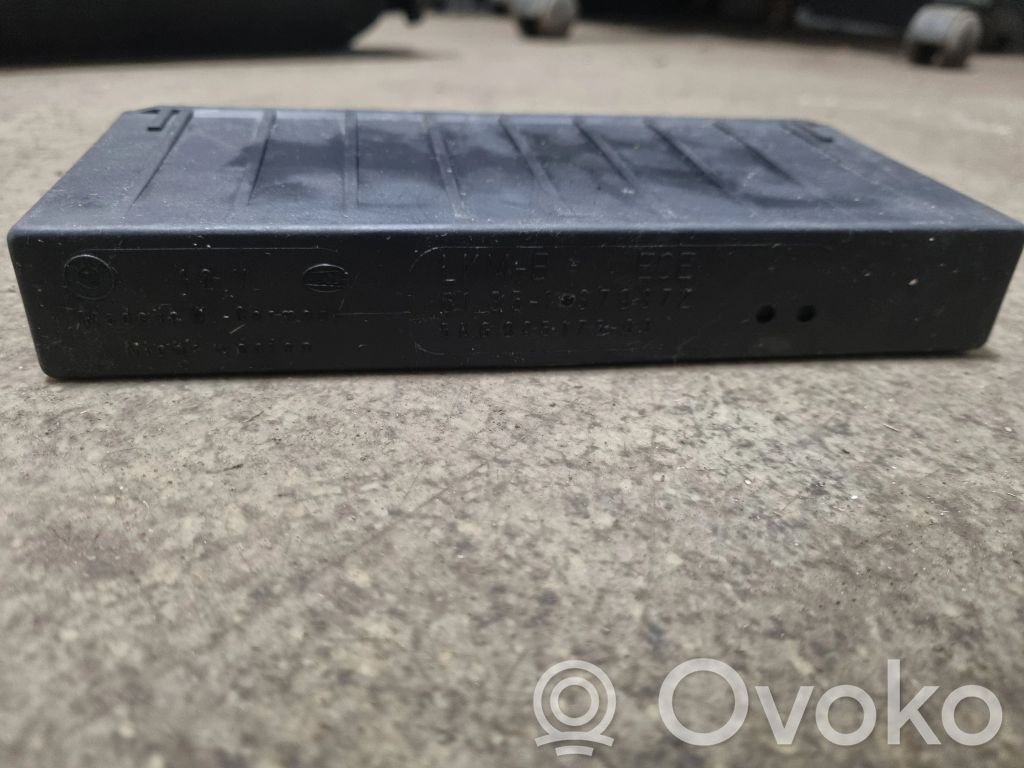BMW 5 E34 Komforto modulis 
