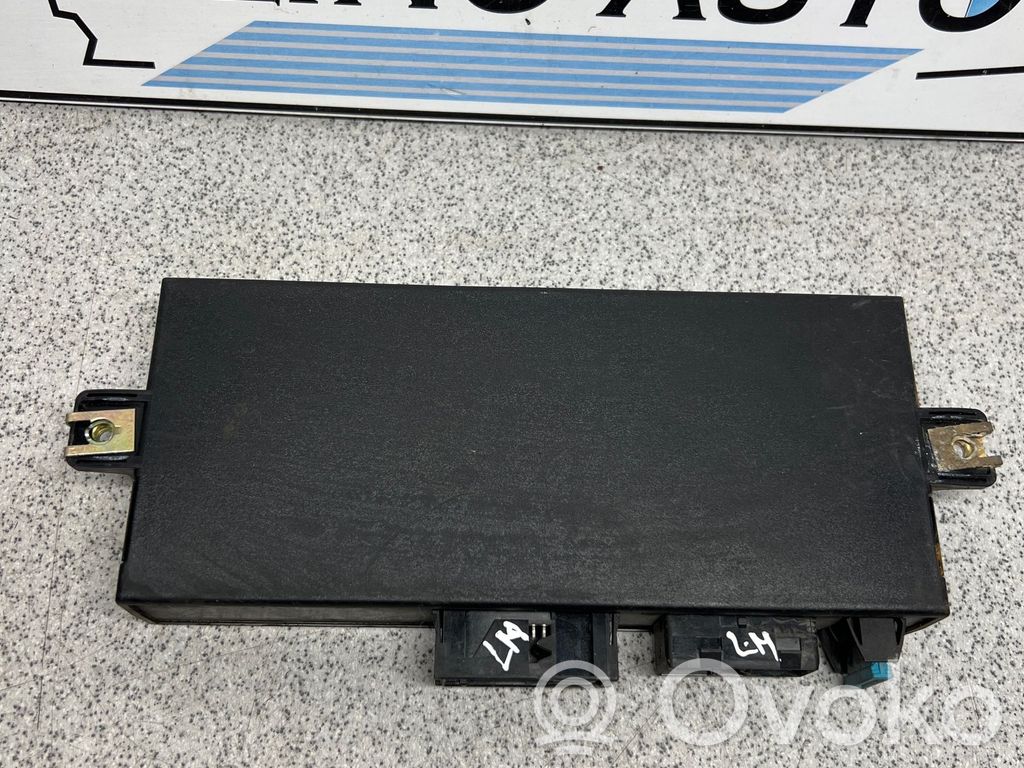 BMW 5 E34 Komforto modulis 
