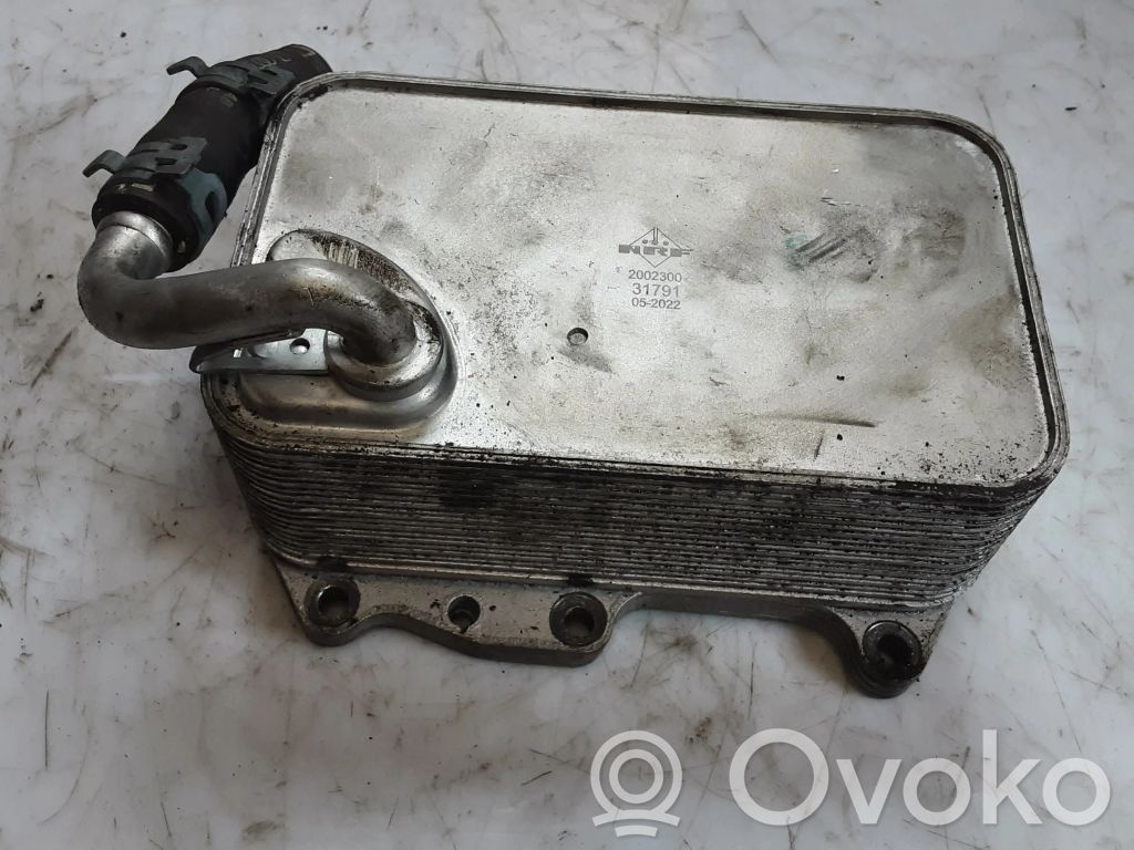 Mocowanie / uchwyt filtra oleju   2002300,31791,052022