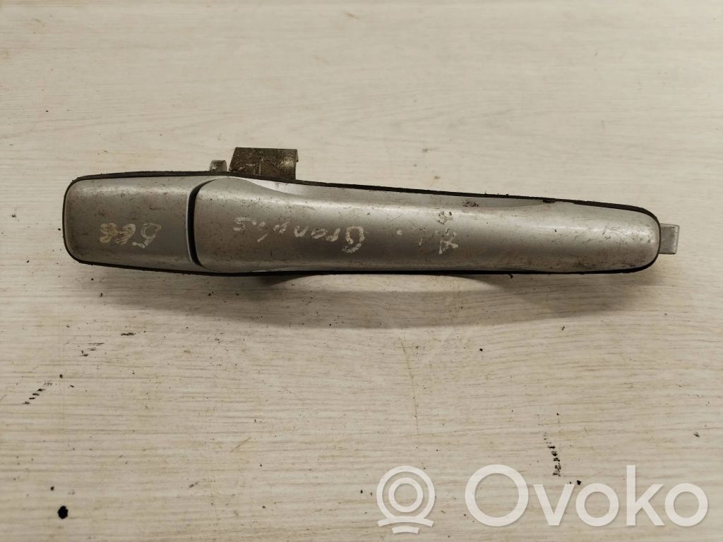 Mitsubishi Grandis Manecilla externa puerta delantera 