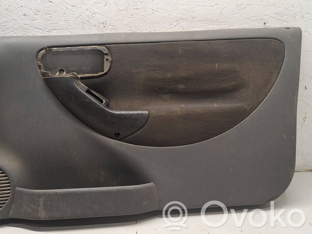Opel Corsa C Обшивка передней двери 